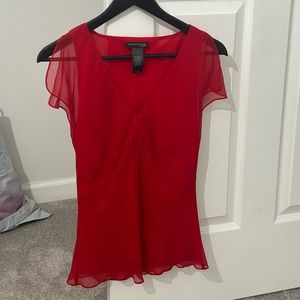 beautiful red blouse with sheer ruffle sleeves and v neck style.